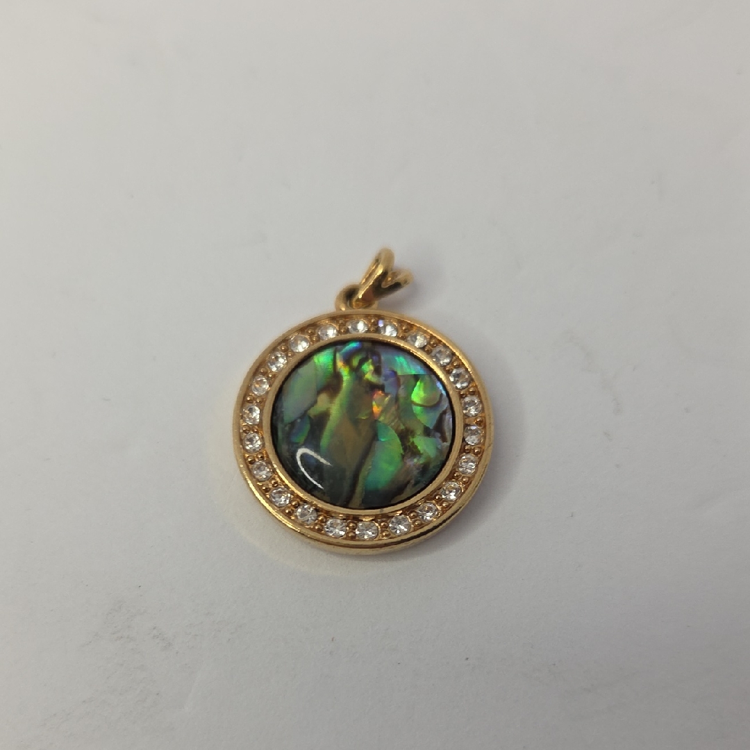 Nina Ricci Round Abalone Shell Pendant Set In A Gold-Plated Frame W/Rhinestones